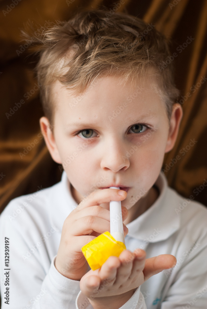 ,a cute playful child in a white shirt ,a cute playful child in a white shirt
