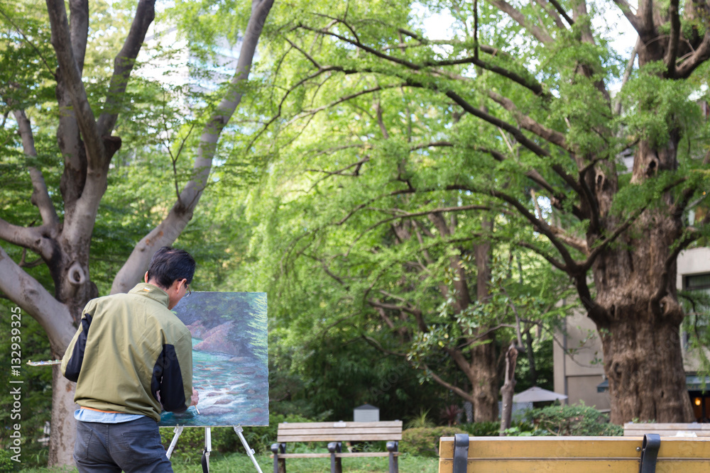 Φωτογραφία asian Japanese man artist painting stream picture in the Ueno park