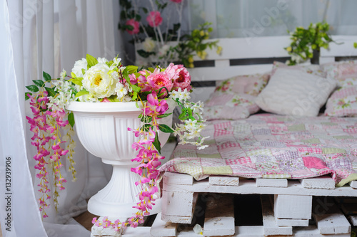 bedroom with the decor of flowers in rustic style
