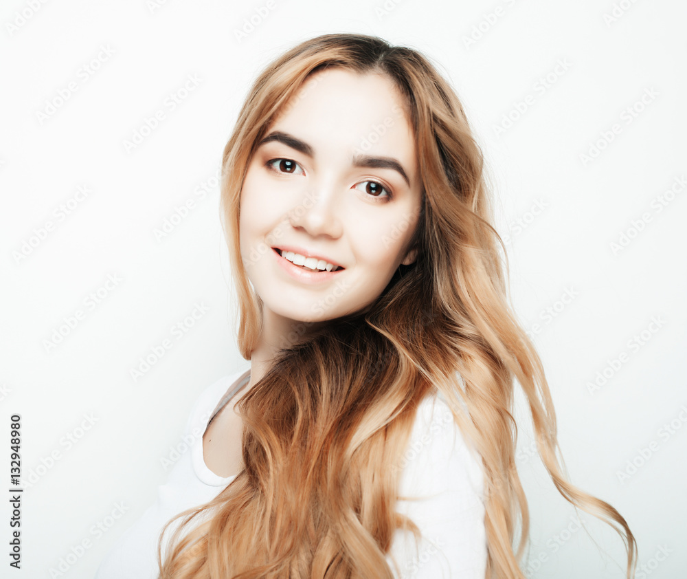 lifestyle and people concept: Young casual woman portrait. Clean face, curly hair. lifestyle and people concept: Young casual woman portrait. Clean face, curly hair.