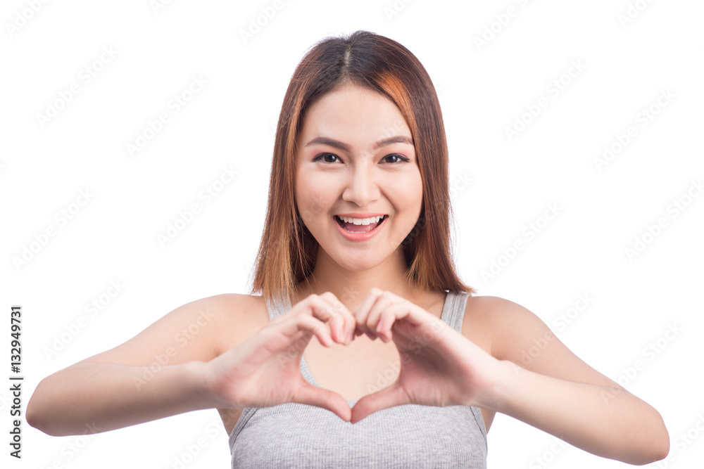 Asian woman gesturing heart shape with hands, isolated on white Asian woman gesturing heart shape with hands, isolated on white