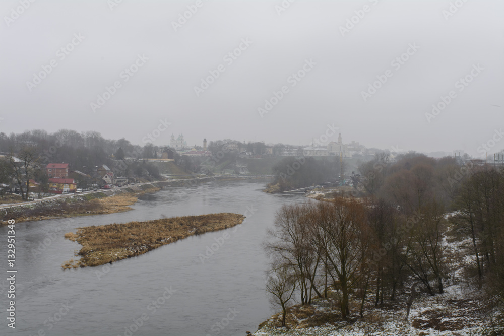 View Kalozha church, old and new castle, the bridge across the river Neman Grodno, Belarus, December 2016, fog,