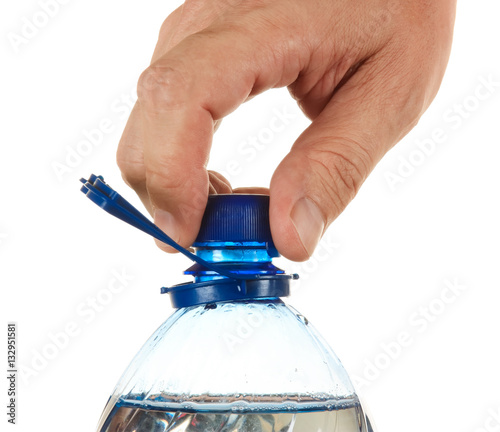 hand unscrew the cork on a bottle of water
