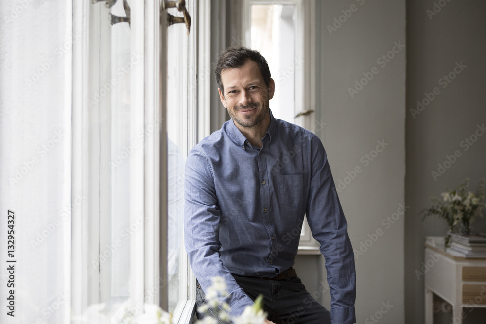 Portrait of content man at home Portrait of content man at home