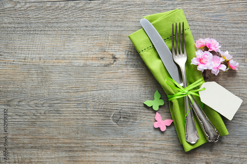 Easter table setting with spring flowers and cutlery