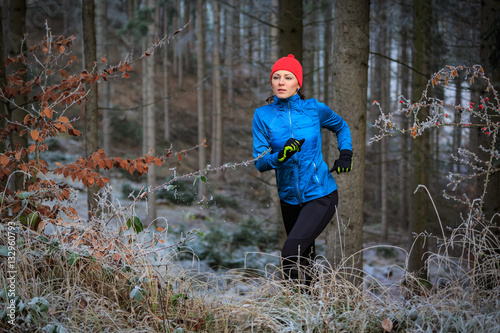 running in the wintry forest