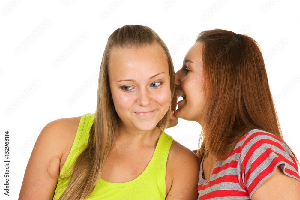 Two teenage girls gossiping Two teenage girls gossiping