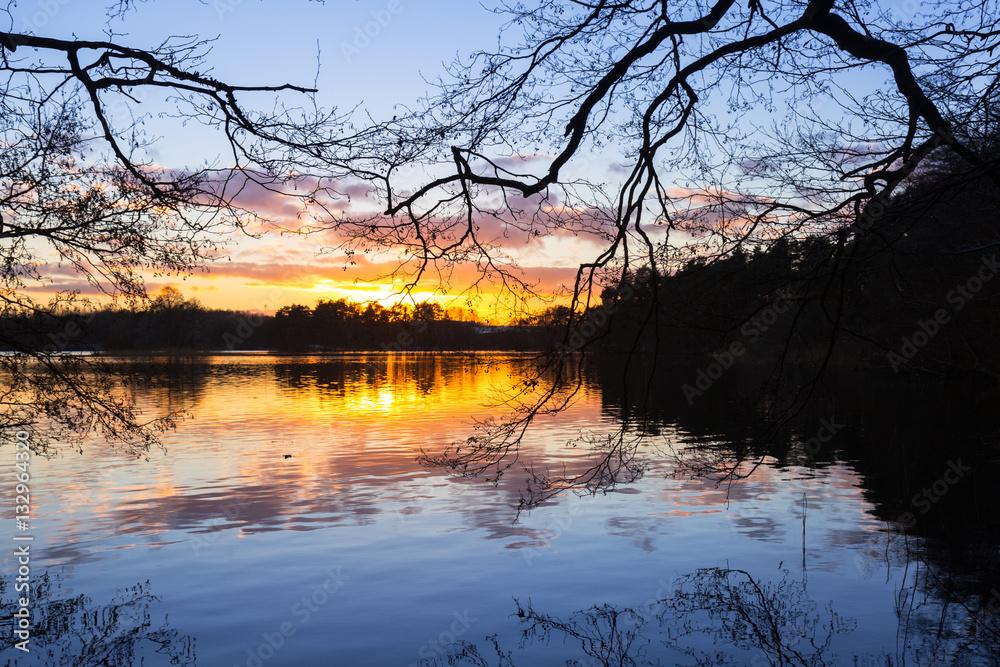 Sunset at the lake in winter, Poland Sunset at the lake in winter, Poland
