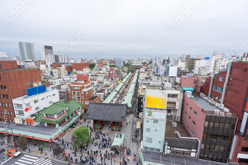 Business and culture concept - panoramic modern city skyline bird eye aerial view with Sensoji-ji Temple shrine - Asakusa district under dramatic sunrise and morning blue sky in Tokyo, Japan
