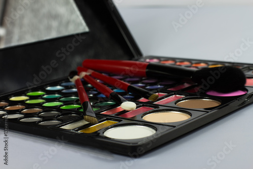 Eyeshadow Palette. Decorative cosmetics. Makeup brushes