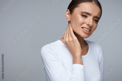 Woman In Pain. Beautiful Girl Feeling Toothache, Jaw, Neck Pain