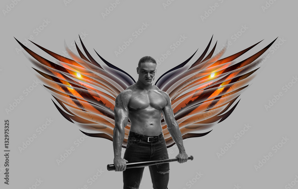 bodybuilder brutal man with naked torso with colored wings behind the ...