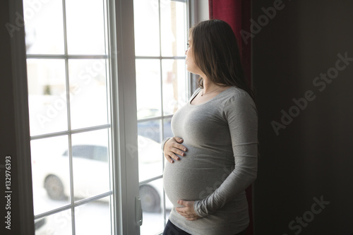 young pregnant woman close to the window Free Download young pregnant woman close to the window - GFXLoad