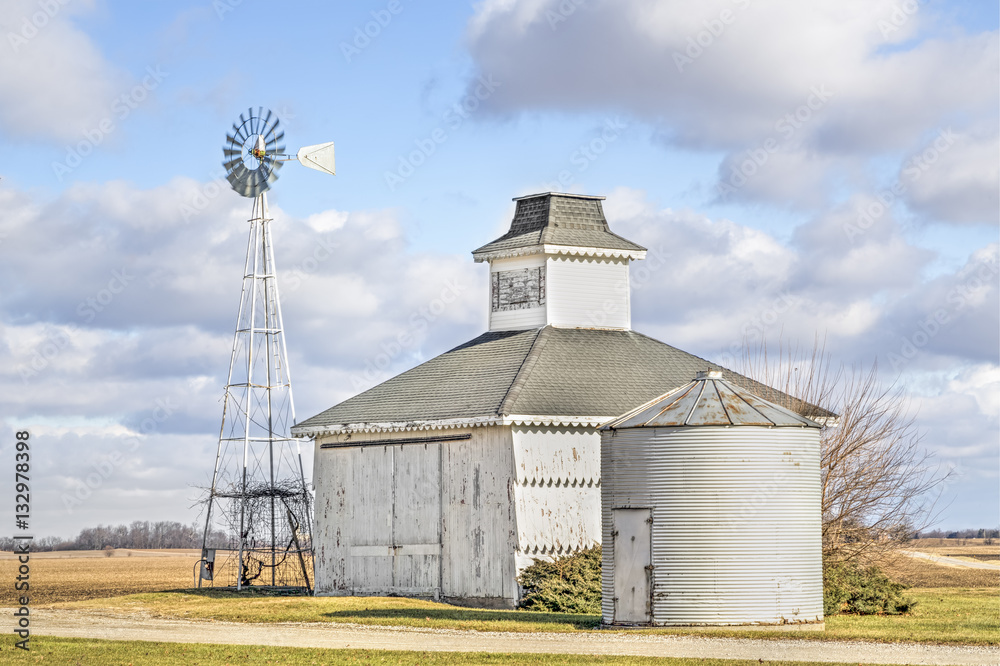 Little Barn, Bin, and Windmill Under a Blue Cloudy Midwestern Sky in Ohio