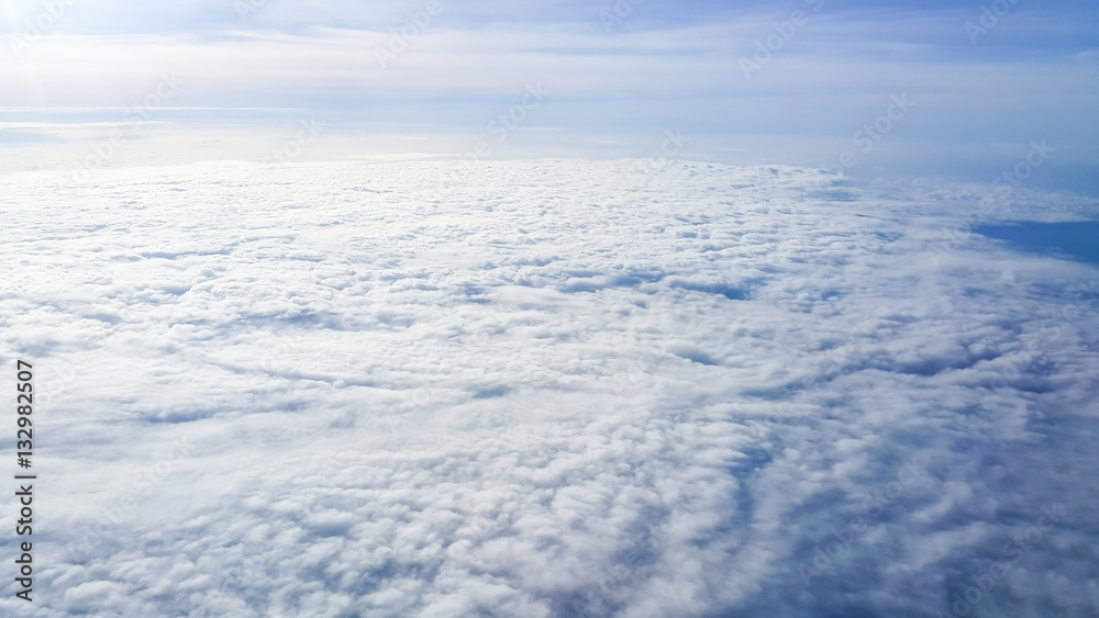 view the outer aircraft on the sky above the clouds in morning