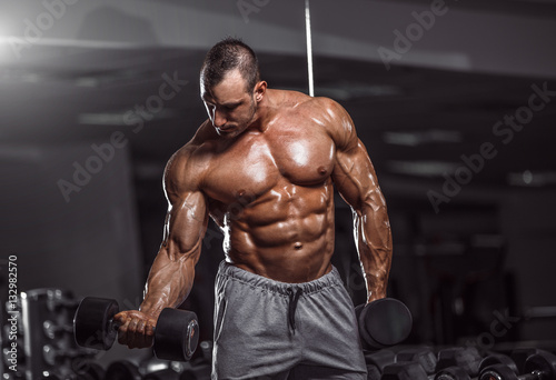 Handsome man exercise in gym. © bojan656