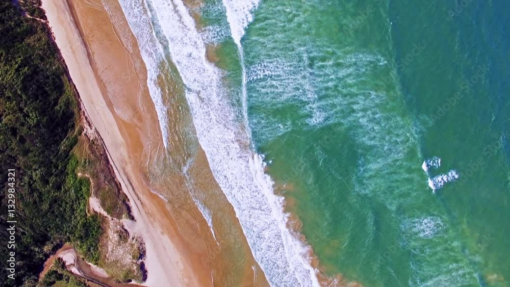 Aerial drone view of beautiful waves coming to sand beach
Aerial drone view of beautiful waves coming to sand beach