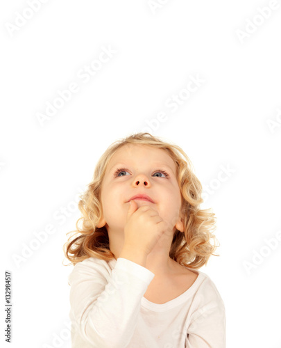 Small blond child imagining something