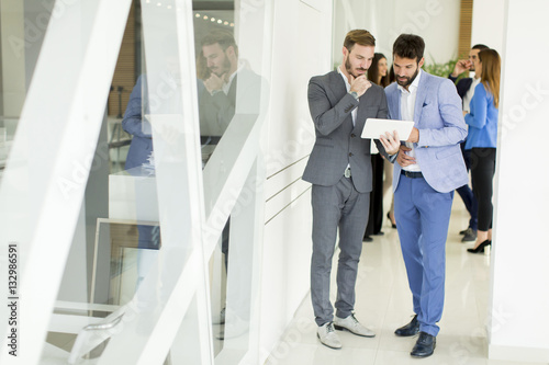 Businessmen with tablet