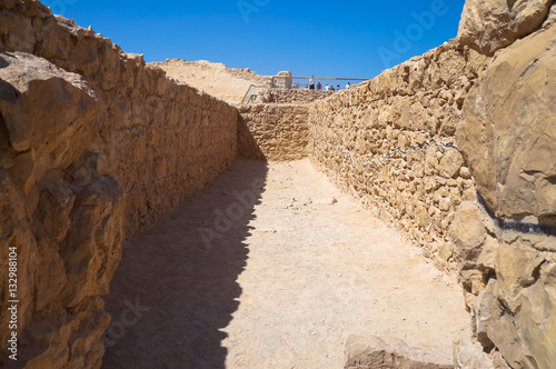 Masada with ropeway and Dead Sea, Israel. Masada was the final battlefield of First Jewish–Roman War. photo