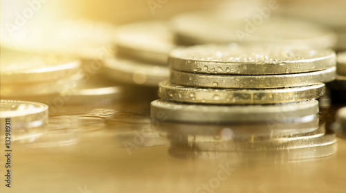 Business success concept - website banner of golden money coins 