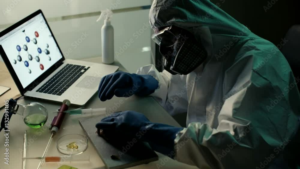 Meat with antibiotic testing for food retail. Elderly experienced scientist work in modern laboratory Meat with antibiotic testing for food retail. Elderly experienced scientist work in modern laboratory
