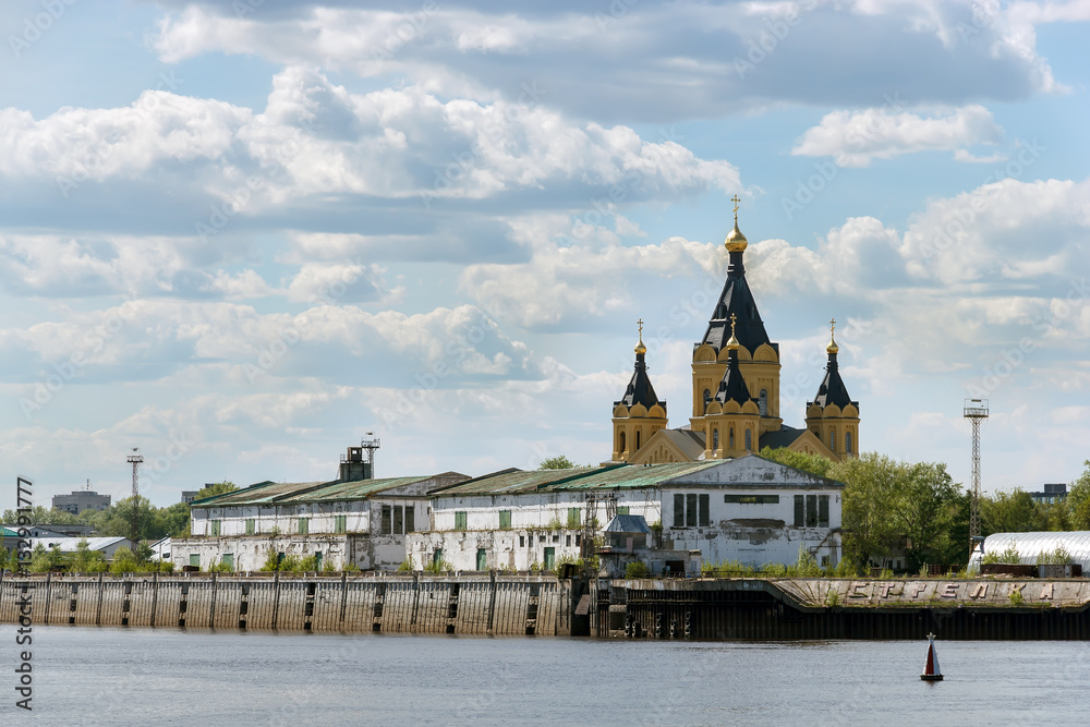 Nizhny Novgorod. The old buildings of the cargo river port on the Strelka and Alexander Nevsky Cathedral