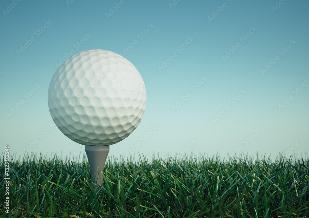 Golf ball with tee in the grass on sky background Golf ball with tee in the grass on sky background