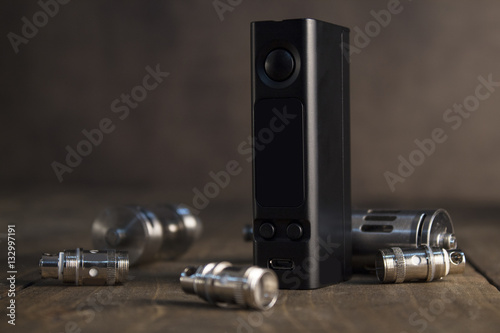 Advanced vaping device, e-cigarette on the table