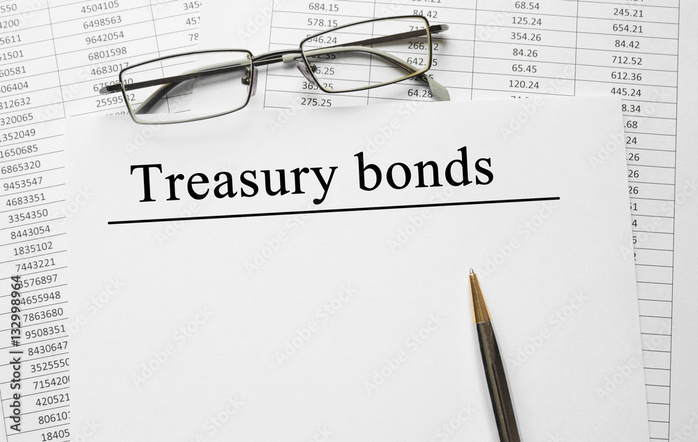 Paper with Treasury bonds on a table Paper with Treasury bonds on a table