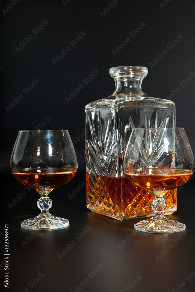 Glass of brandy and a carafe Glass of brandy and a carafe
