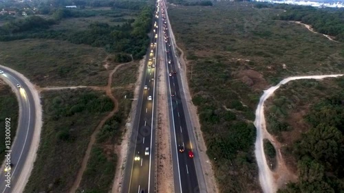 The busy city aerial tracking, road junction, traffic jam