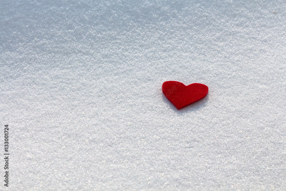 Fototapeta premium Red heart in the snow