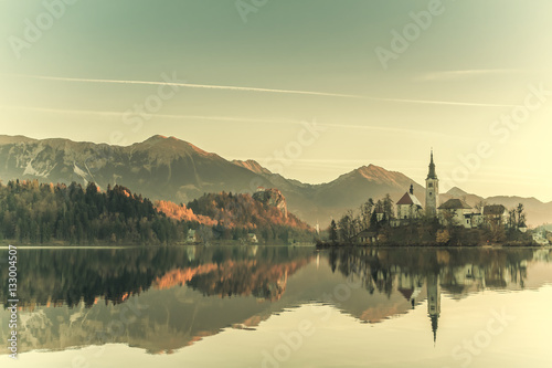 Vintage Lake with Island in Mountains © firewings
