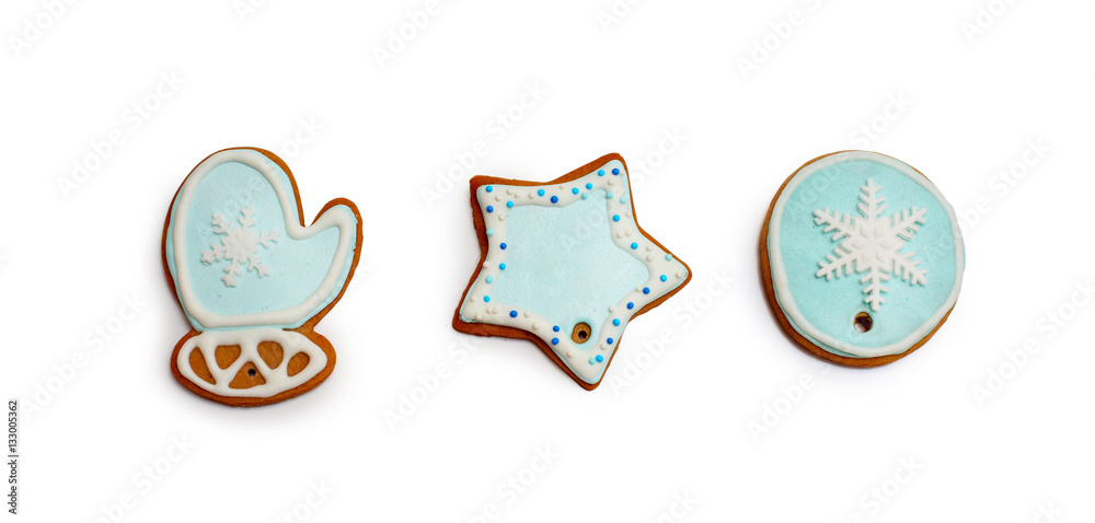 ginger cookies in blue glaze on a white background