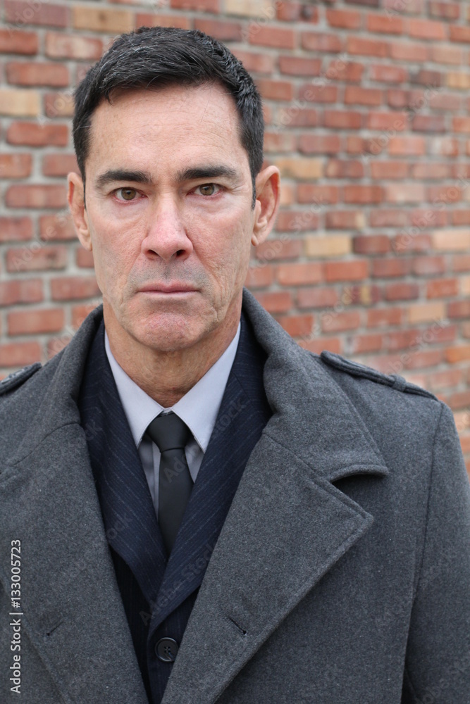 Stern looking businessman close up Stern looking businessman close up