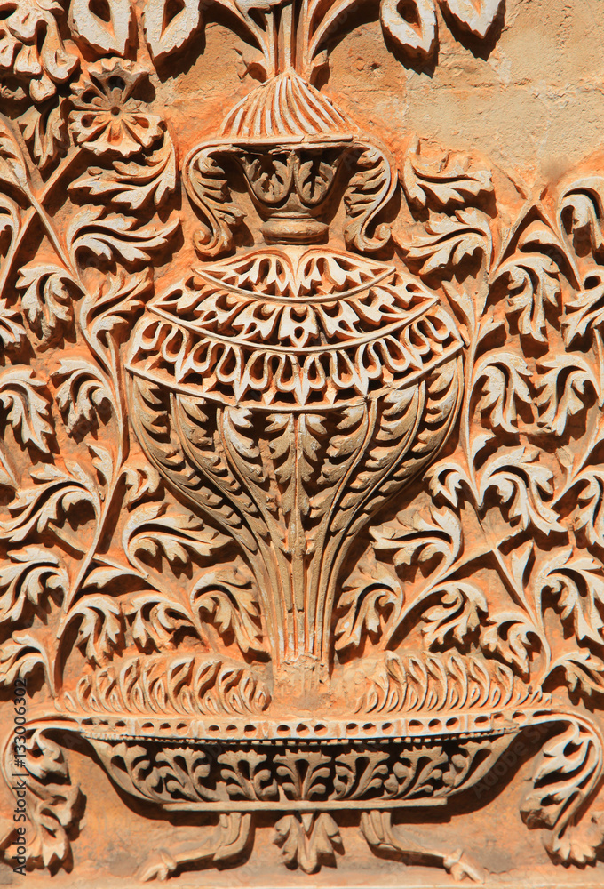 Intricate design carved on walls of Paigah tombs ruins in Hyderabad India