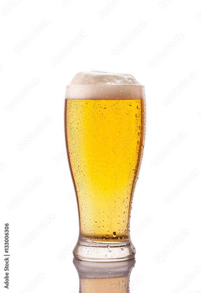 light cold beer in frosty glass isolated on white light cold beer in frosty glass isolated on white