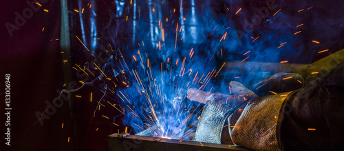 Industrial steel welder in factory technical,
