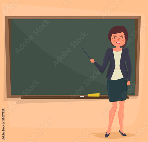 Teacher standing in front of blackboard