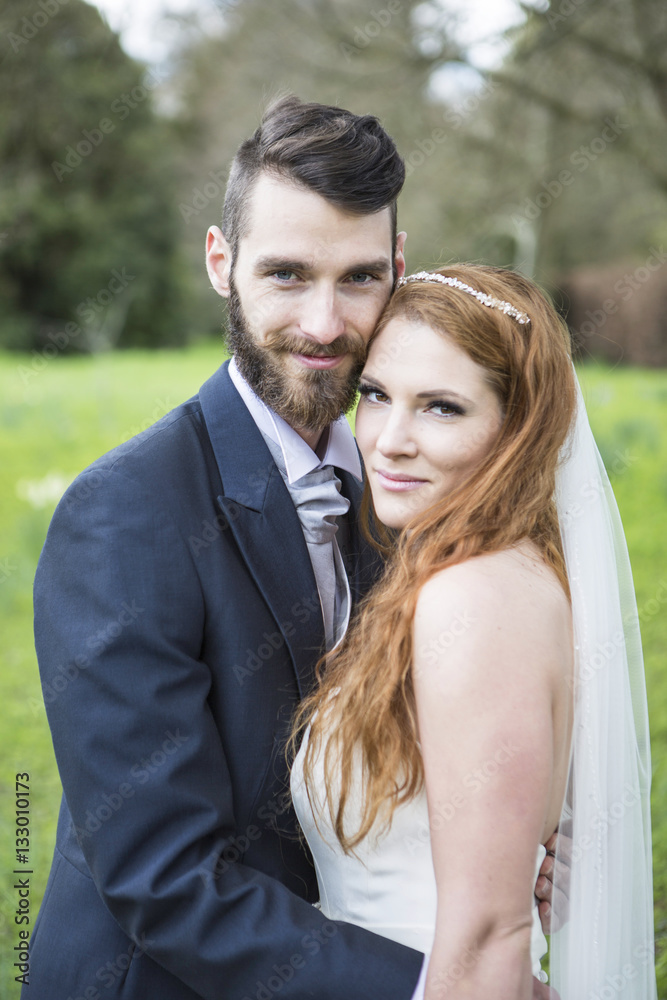 Portrait of bride and bridegroom embracing Portrait of bride and bridegroom embracing
