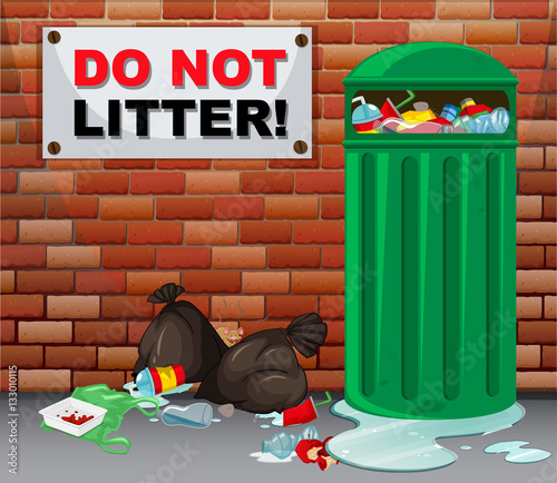 Do not litter sign with lots of trash underneath