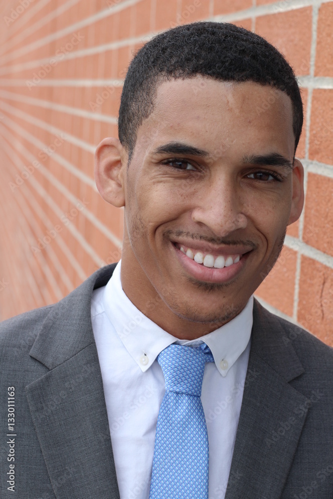 Close-up of smiling young, dark-skinned businessman Close-up of smiling young, dark-skinned businessman