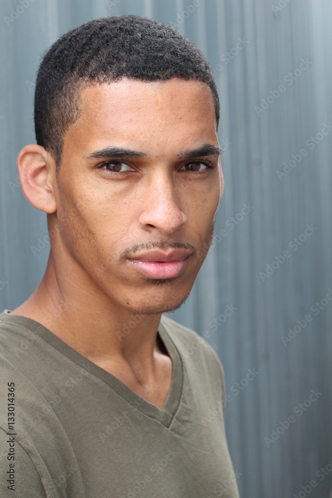 Obraz premium Striking man with neutral expression close up