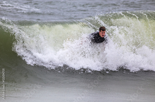 Young Man Body Surfing © Stephen Bonk