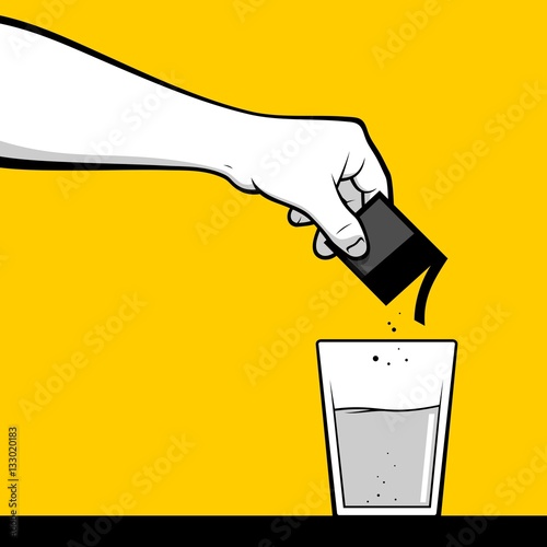 Hand dropping medicine in a glass