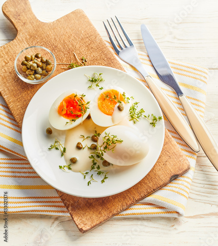 Savory hard boiled eggs with mustard sauce