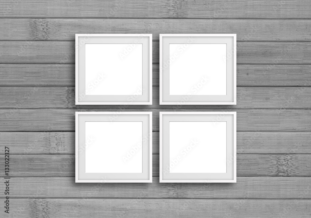 White frames on grey wooden panels wall. Interior decor background, gallery style mock up White frames on grey wooden panels wall. Interior decor background, gallery style mock up