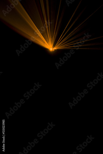 Laser beam orange on a black background