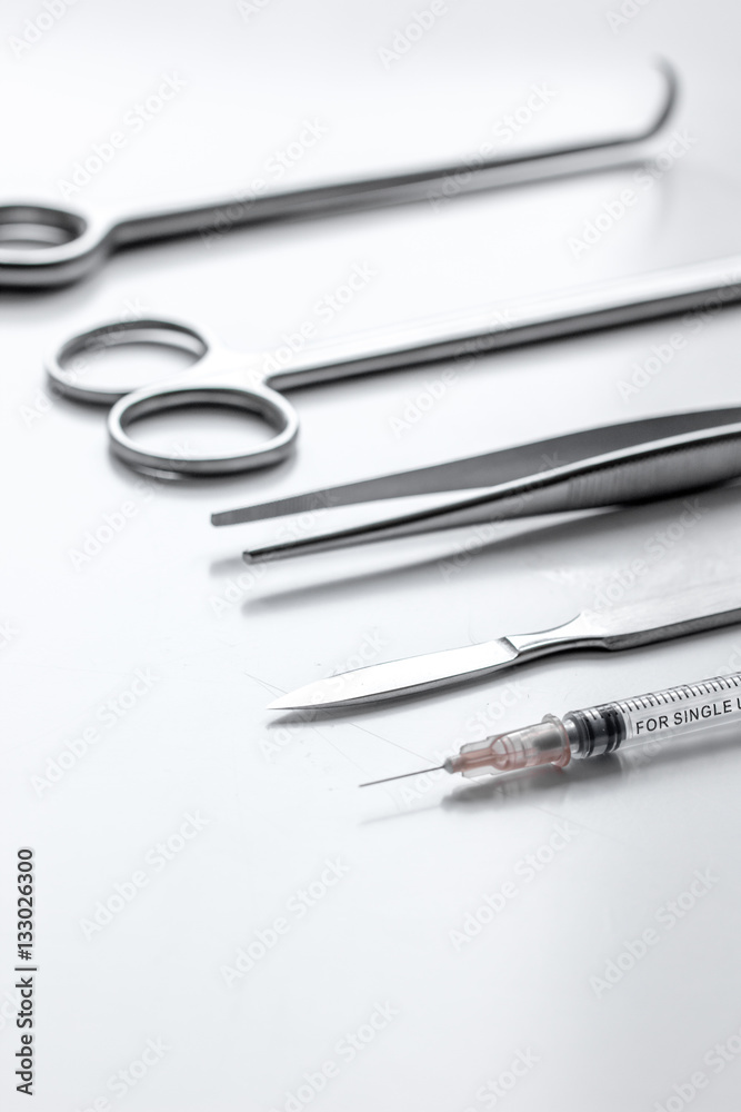 instruments for plastic surgery on white background instruments for plastic surgery on white background
